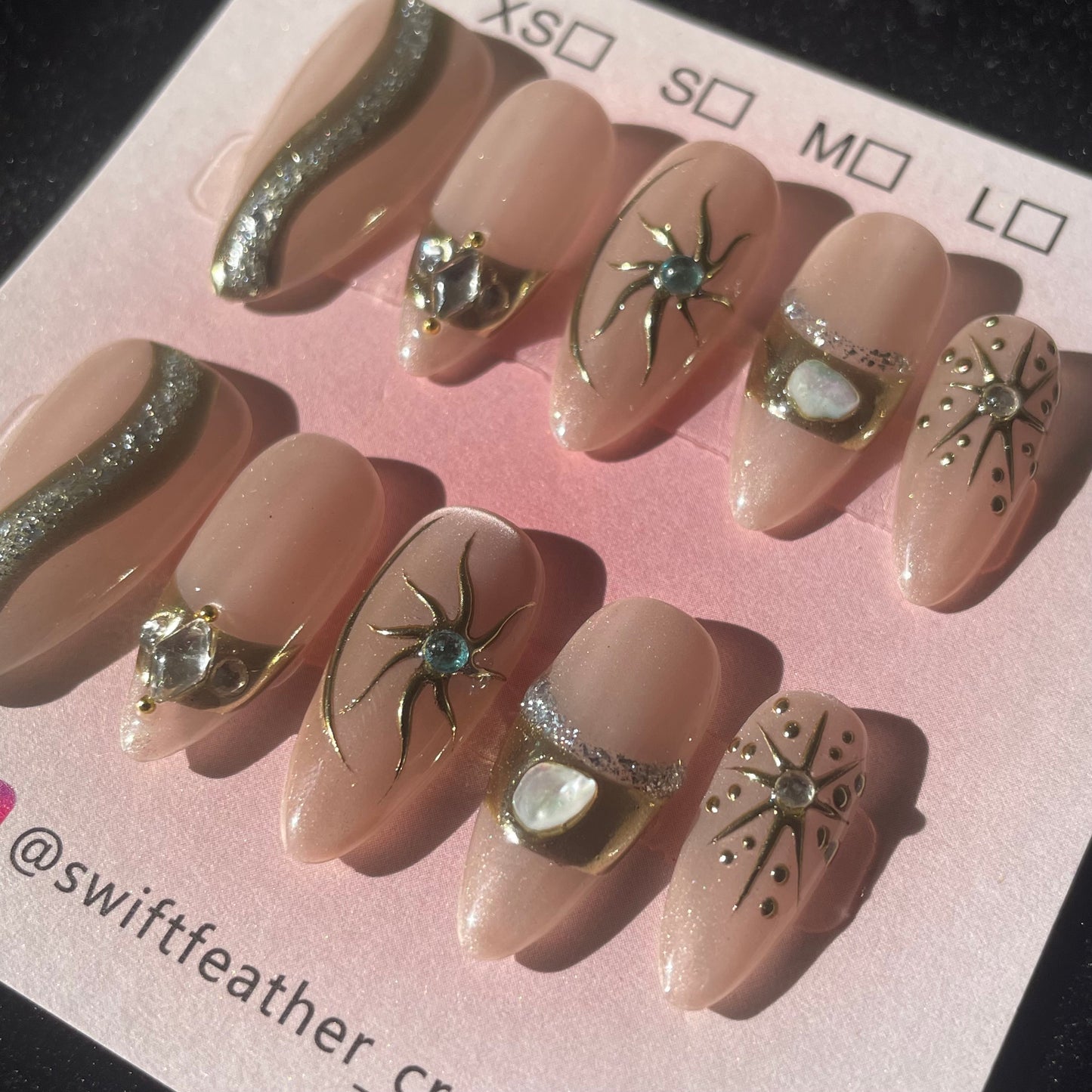 Champagne Glow Long Almond Press-On Nails with Gold Starburst Accents
